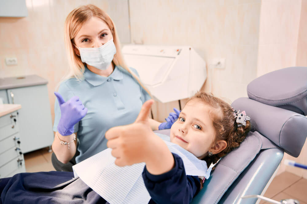 Dentista e bambina
